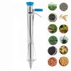 Long-handled stainless steel bulb planter tool